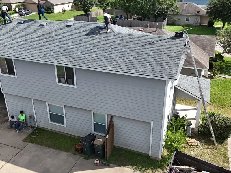 Crew member working on a roof