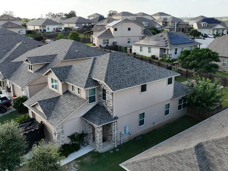Shingle roof on a stone-accented home